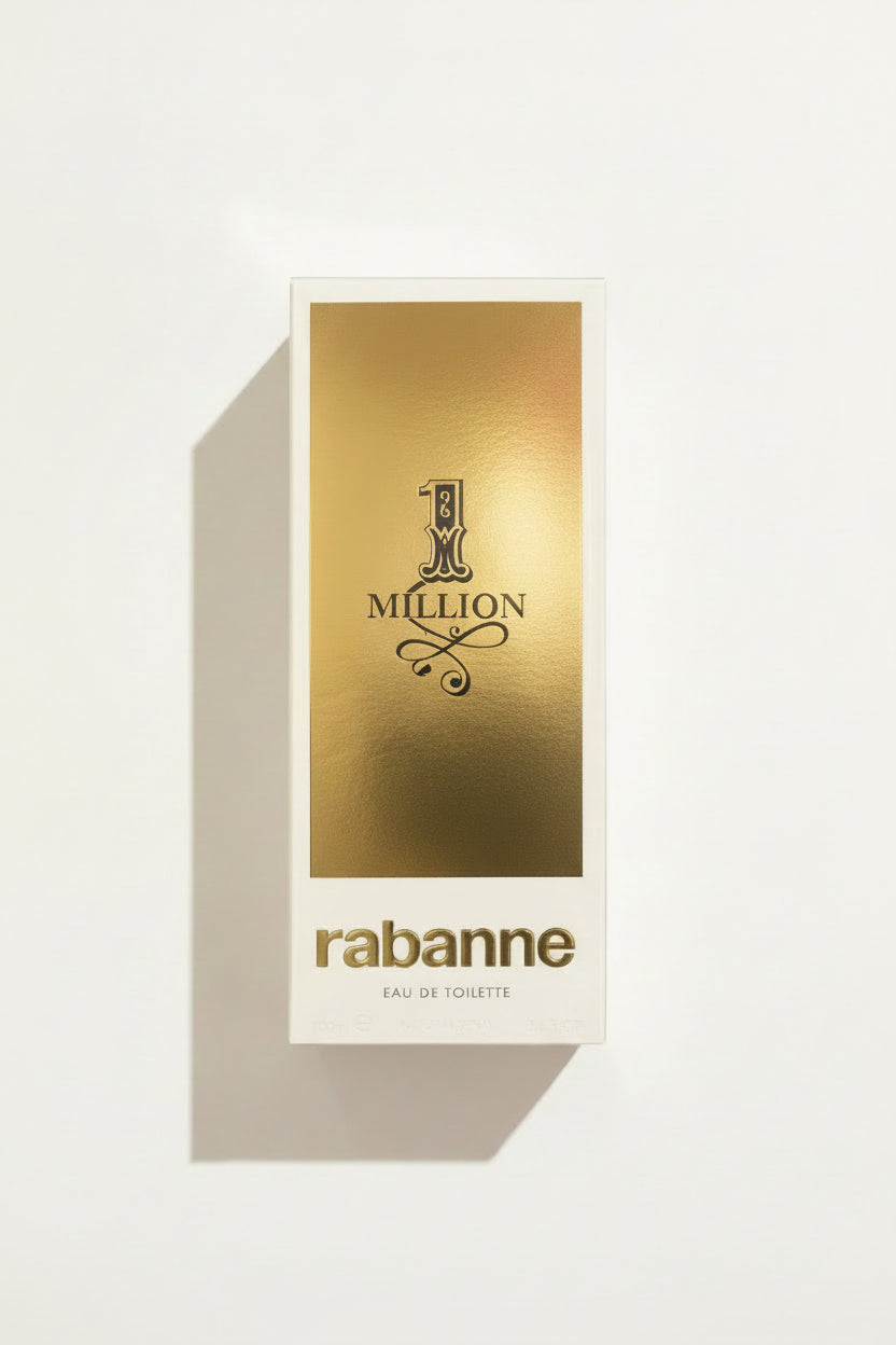 A  rectangular box of Rabanne 1 Million Eau de Toilette, featuring a metallic gold and white design with black text.